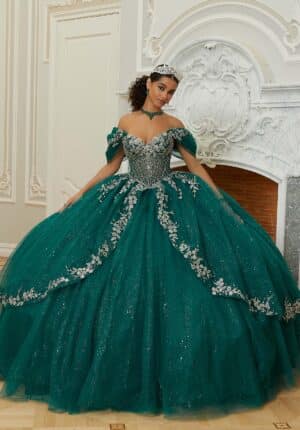 a green and silver quinceanera dress