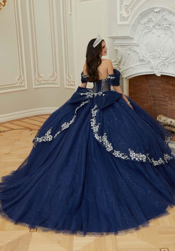 the back of a blue quince dress