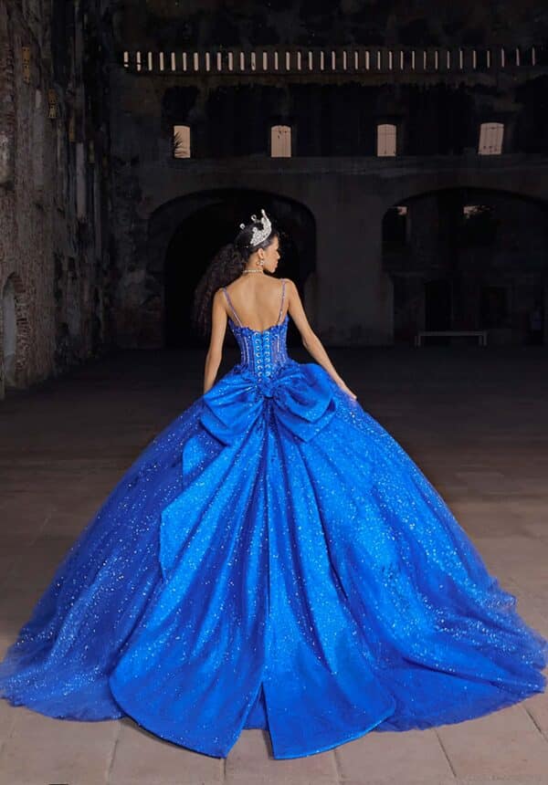 the back of a dark blue quince gown