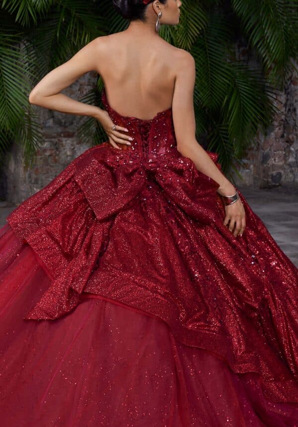 the back of a red quince gown
