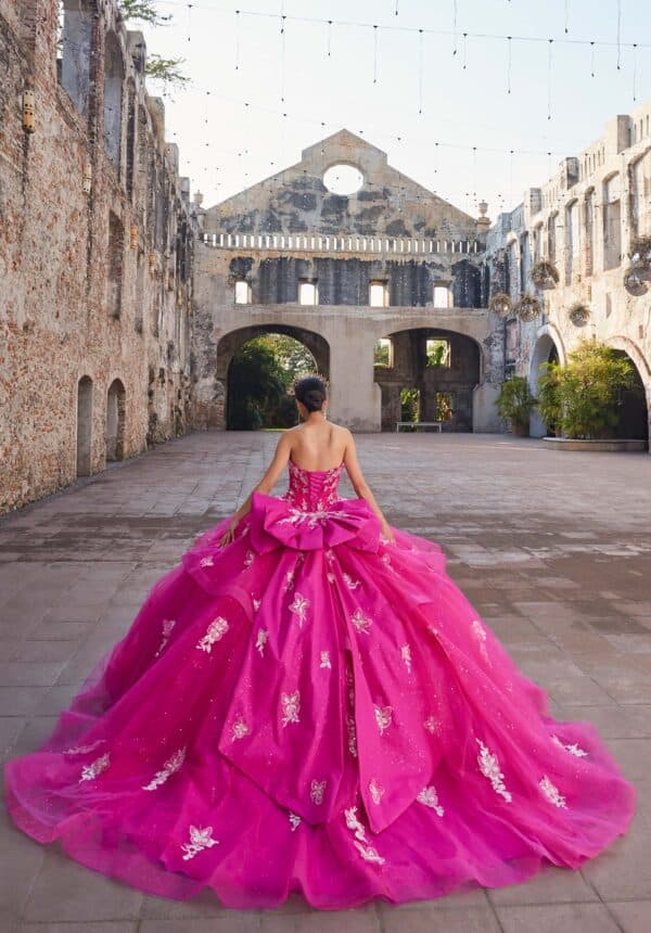 the back of a pink dress without sleeves